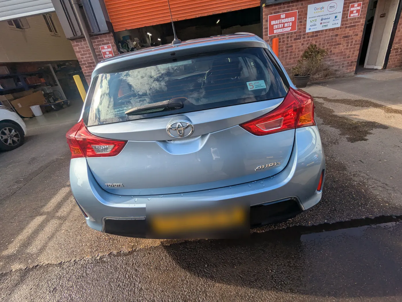 After: The same Toyota Auris with the rear bumper repaired and refinished