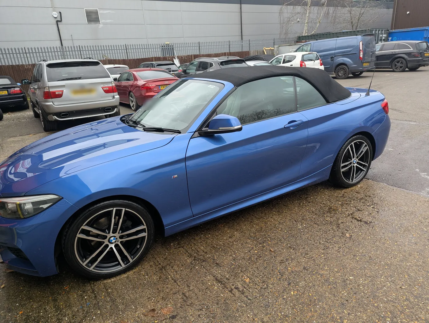 After: The same BMW 2 Series with the rear wing repaired and resprayed
