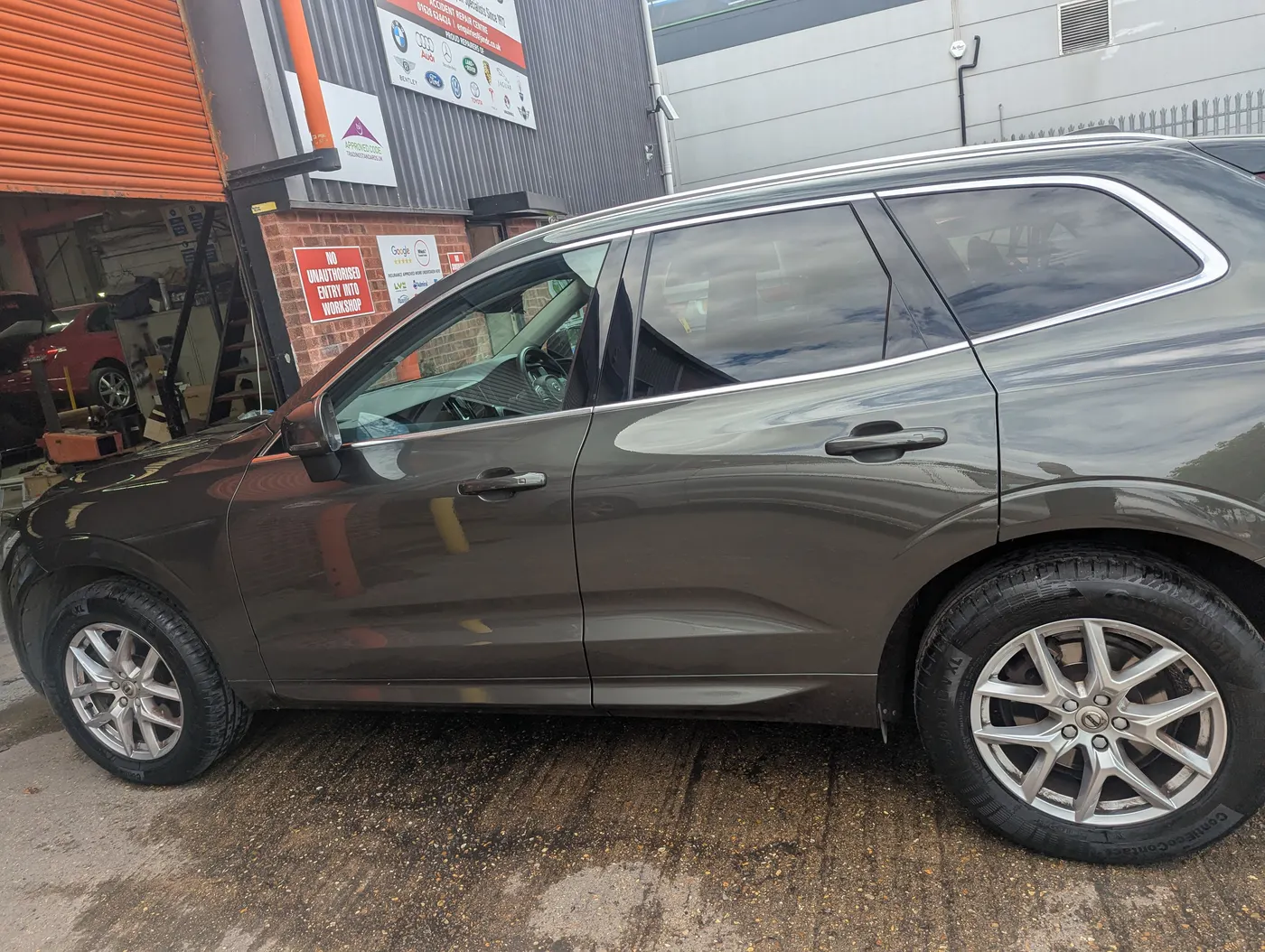 After: The same Volvo XC60 with the rear door and wheel arch repaired